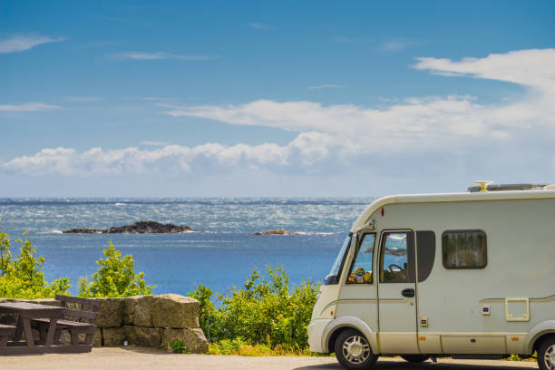 istock Camper car on coast of Norway with ocean view 1189126971