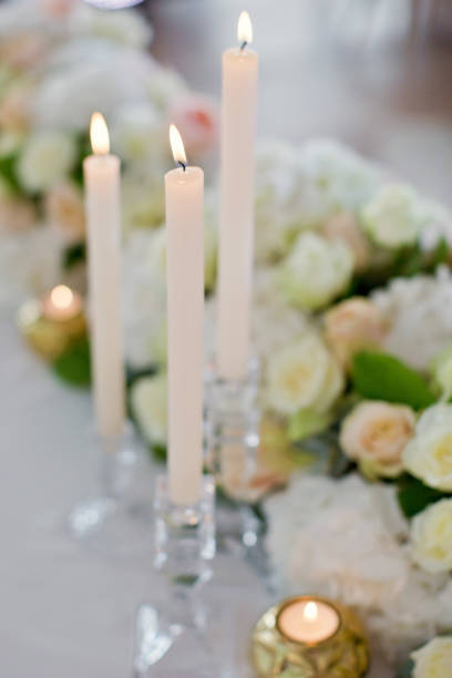 istock beautiful flowers compositions and candles 1189129217