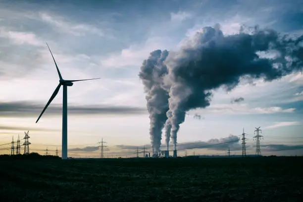 Photo of Wind energy versus coal fired power plant