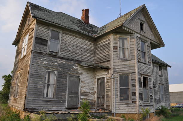 istock Old abandoned two-story wooden house 1189130058