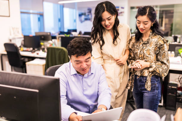 istock Business people working together in modern working office 1189131293