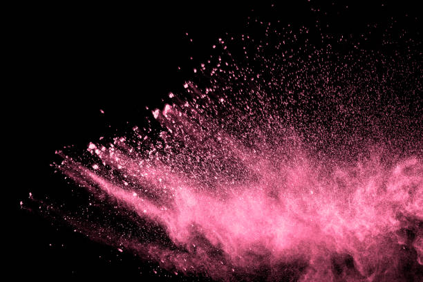 istock Explosion of pink colored powder isolated on black background.Pink dust splash. 1189133189