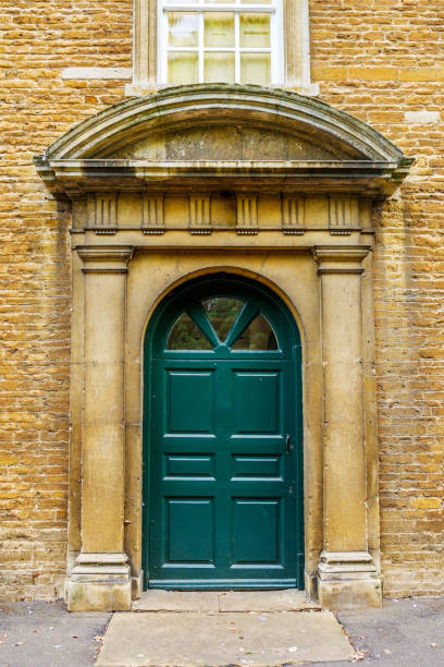 istock old vintage door on a stone wall in england uk 1189133599