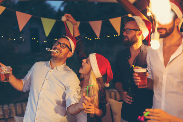 istock Friends having fun at New Years Eve party 1189133639