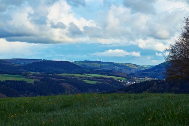 istock Small village set in the rolling hills of the Eifel, Germany. 1189134832
