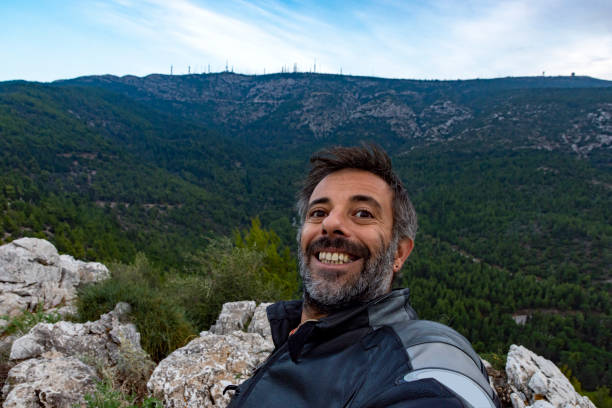 istock Young man solo traveler taking selfie 1189134895