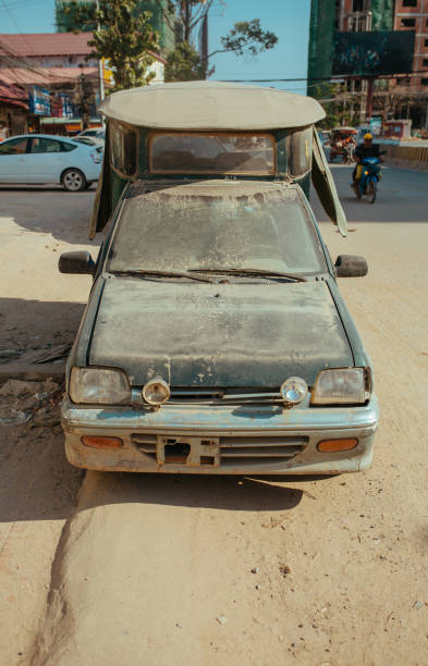 istock Old broken and rusty Car in summer Asia 1189136631