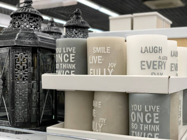 istock Decorative candles on a shelf in the store. 1189136864