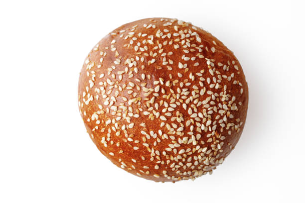 istock Homemade sourdough bread. Burger bun isolated on white background 1189141229