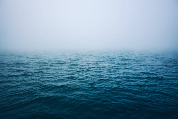 istock Sea ripple water with morning fog. 1189141284