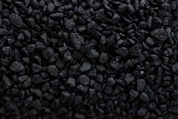 istock Black road stones gravel texture 1189141501