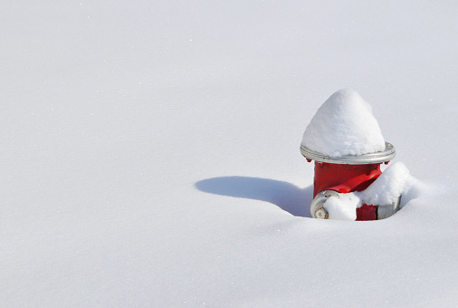 Snow cap at fire hydrant