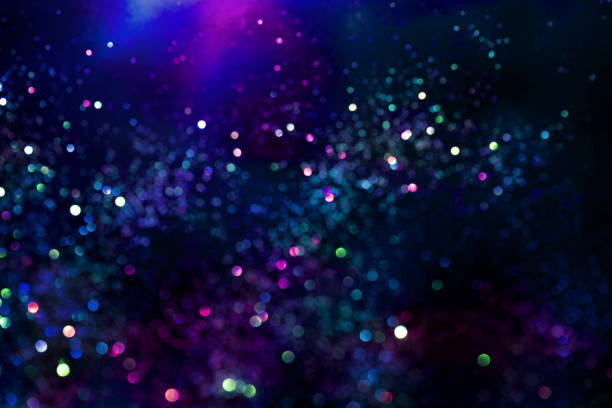 istock glitter bokeh lighting effect Colorfull Blurred abstract background for birthday, anniversary, wedding, new year eve or Christmas 1189141786