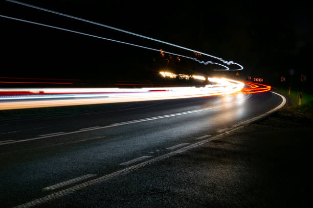 istock lights of cars with night 1189142042