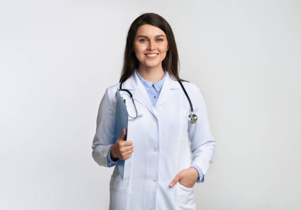 istock Therapist Lady Smiling At Camera Holding Folder Over Gray Background 1189143550