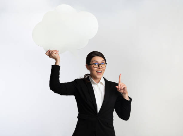 istock Excited Business Girl Holding Speech Bubble Standing In Studio, Mockup 1189143636