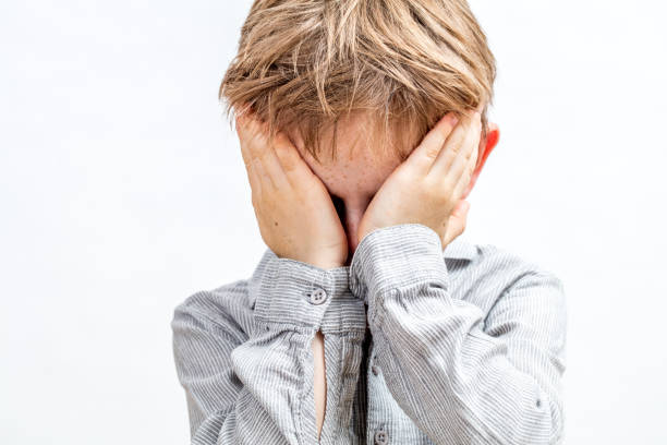 istock tired child scratching eyes, crying, bored, shy or playing peekaboo 1189143867