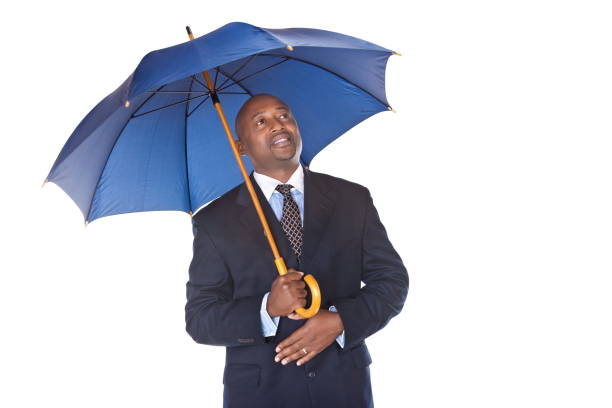 business man in suit with umbrella  isolated on white
