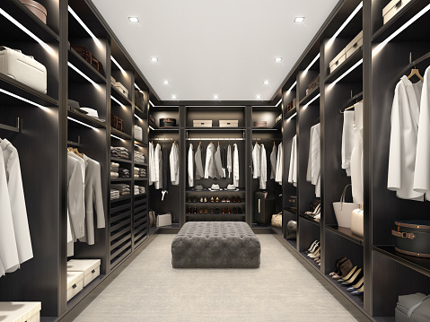 3d render of a modern black luxury walk in closet room with tufted velvet stool and carpet and clothes