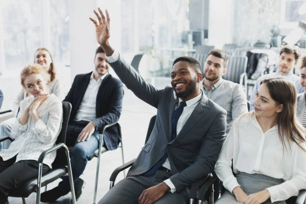 istock Black businessman having question at company seminar 1189147314