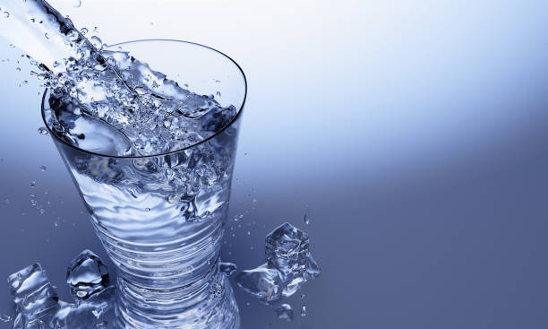 istock 3D Rendering of  Pour water on glass with reflection on table surface 1189148687