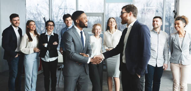istock CEO manager congratulating successful worker after meeting 1189149007