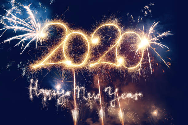 istock Sparkler Happy New Year 2020 With Fireworks 1189149029