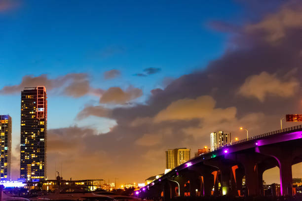 istock MacArthur Causeway and skyscrapers in Miami at night 1189152088