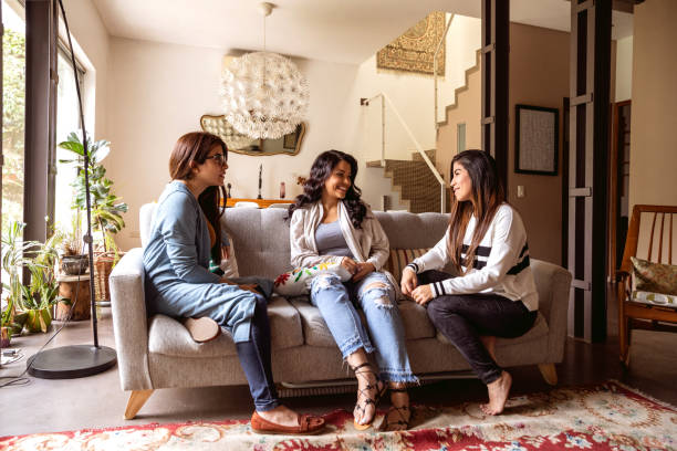 istock Latin women at home, relaxing and taking a break from studying 1189155966