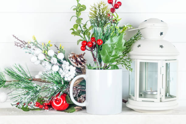 Christmas mug mockup for design show - mug  with fir branches, cones and Christmas lantern