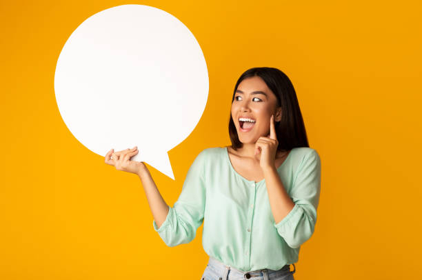 istock Amazing offer. Girl holding empty speech bubble 1189158276