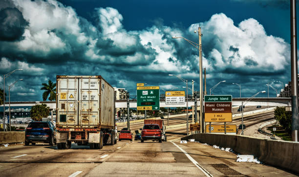 istock Dark clouds over the highway in Miami 1189160648