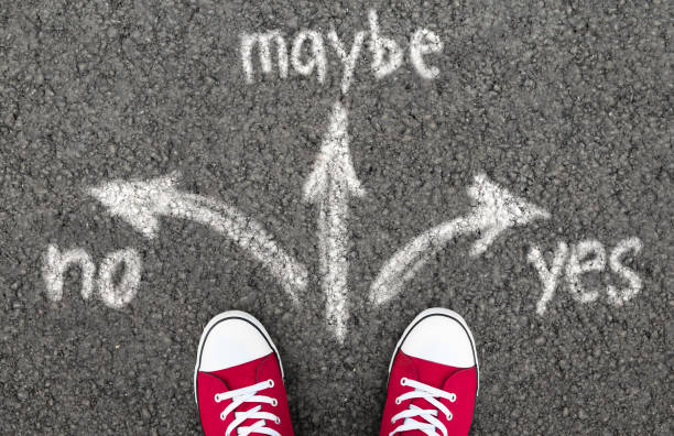 istock Teenager choosing between yes, maybe or no 1189160666