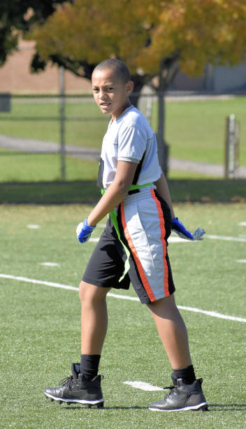 istock Flag Football:  Player Walking off the Field 1189163242