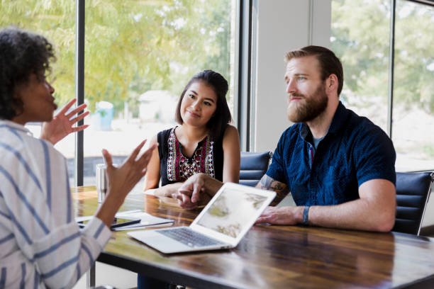 istock Encouraging counselor talks with couple 1189163277