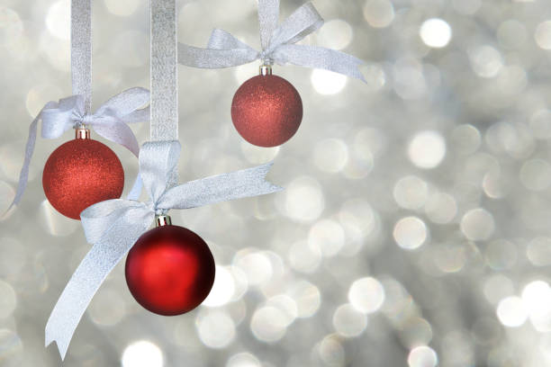 istock Red Christmas Decoration Elements on Silver Bokeh Background 1189164966
