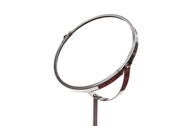 istock Cosmetic mirror in a metal frame on a stand 1189165321