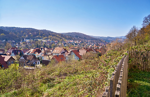 View from the fence on the hillside to the historic half-timbered houses of the city of Wernigerode. Saxony-Anhalt, Germany