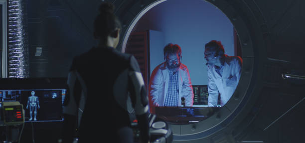 istock Female astronaut walking on treadmill 1189167788