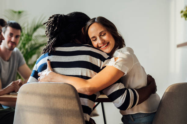 istock Happy Couple Hugging at Dinner Party 1189167989