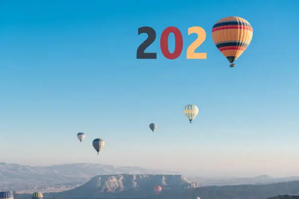 Photo of Writing with Hot air balloons 2020 Cave city in Cappadocia