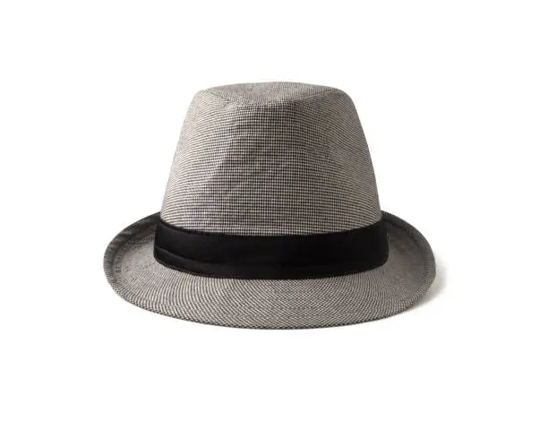 Front view of fedora black and white hat with band. Head dress in gangsters fashion style isolated on white background