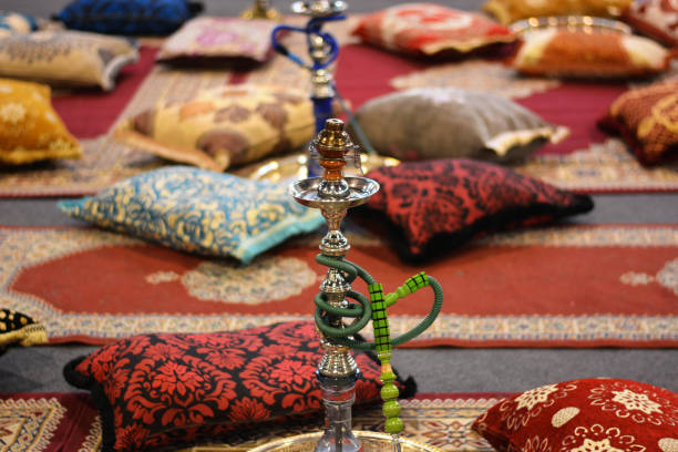 shisha for smoking aromatic tobacco traveling in the eastern markets djemma el fna square stock pictures, royalty-free photos & images