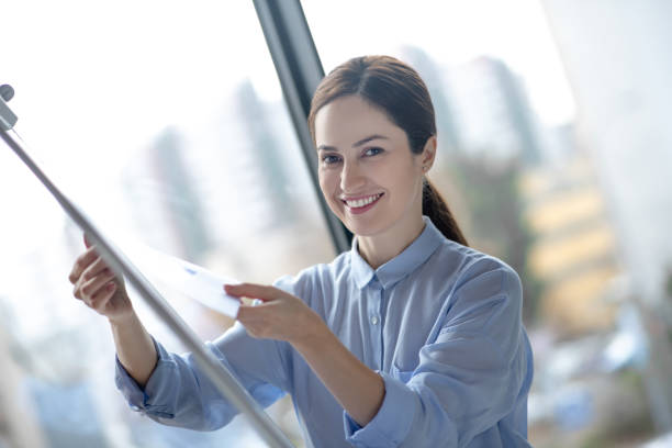 istock Businesswoman feeling motivated before presenting new project 1189175509