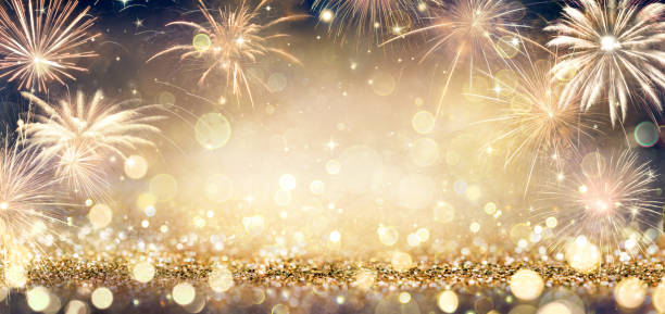 istock Golden Glitter Background With Fireworks In The Night 1189177409
