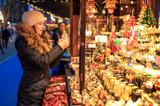 Choosing a gift at a Christmas market stall