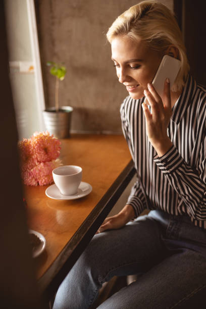 istock Pretty woman inviting her boyfriend for coffee 1189179088