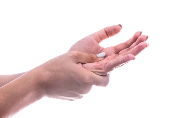 istock Feeling pain in female hands isolated on white 1189179355