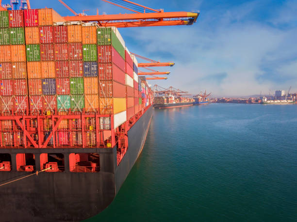 istock Aerial view cargo ship at commercial port. 1189179394