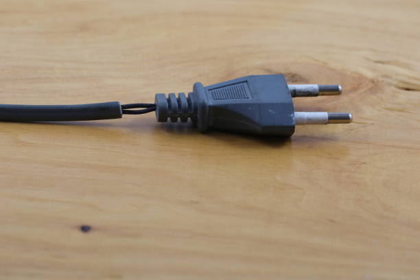 istock Electric plug with a damaged cord. 1189184577
